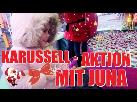 Juna Wünsche mit Papa Henning Merten auf dem Weihnachtsmarkt